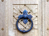 External oak door, wrought iron handle & carving.