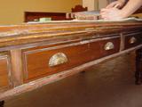 Edwardian mahogany table drawer fronts prior to restoration