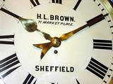 H L Brown Wall Clock Name on Dial.