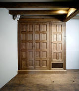 Oak doors for access, storage & air vent.